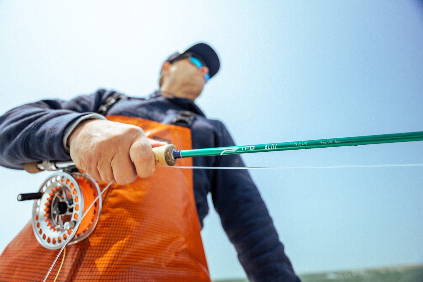 Angler casting the TFO Blitz fly rod